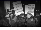 A group of people holding signs

Description automatically generated with medium confidence