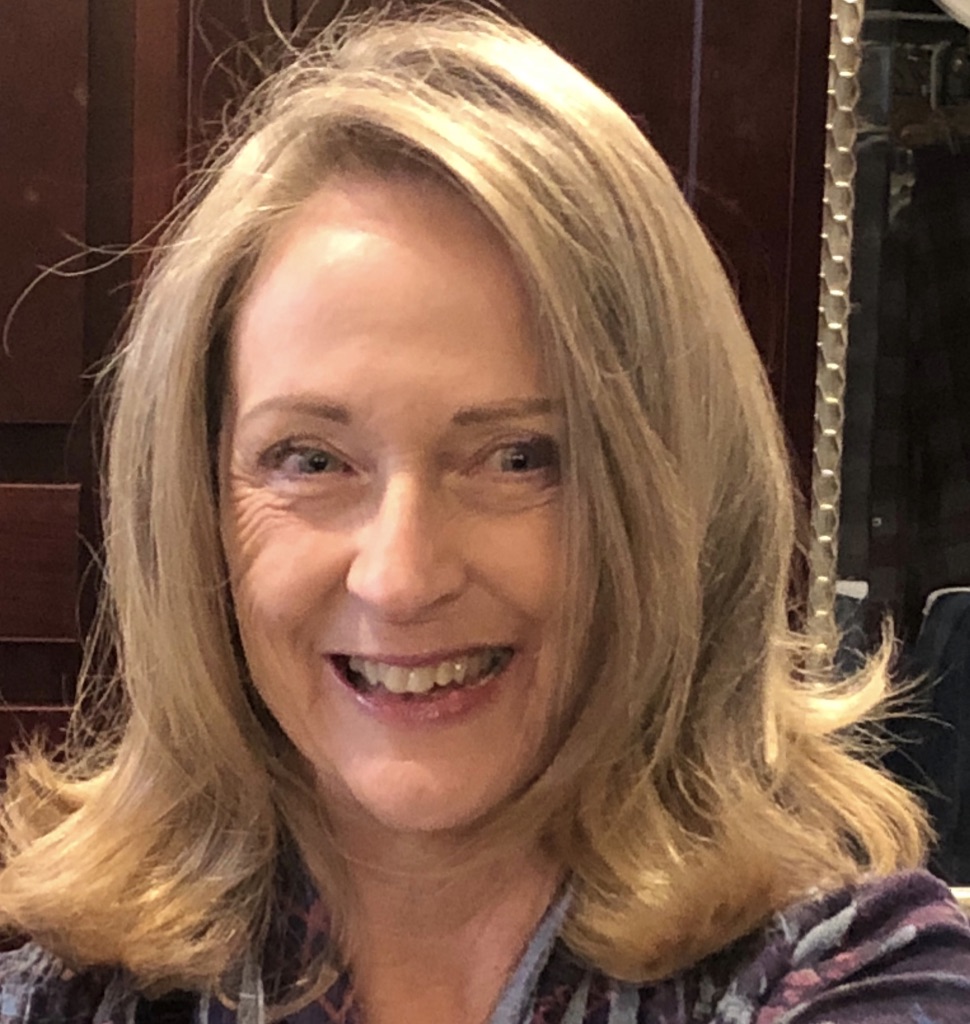 A close up of a person

Description automatically generated